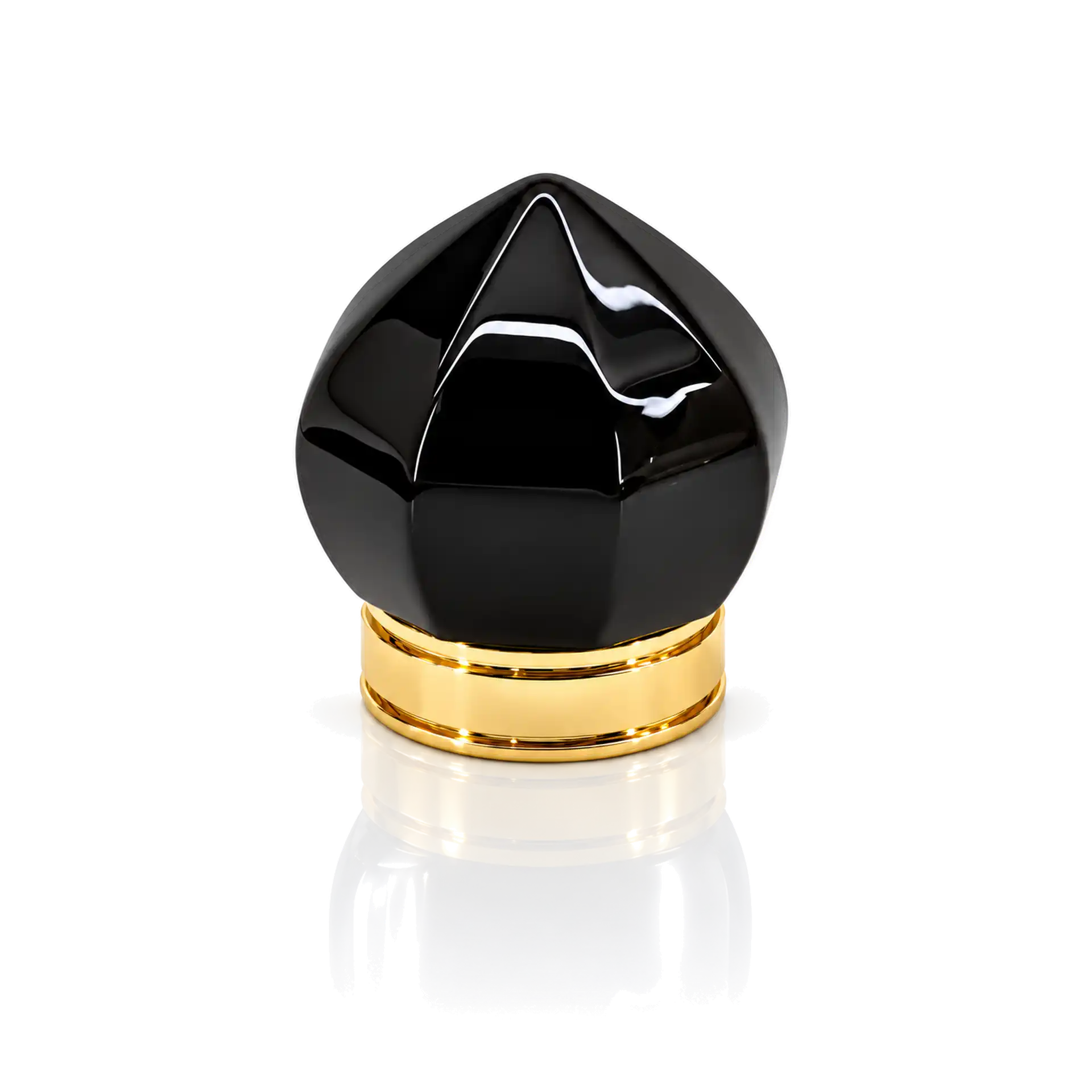Parfümflakon, schwarzer Verschluss, goldener Kragen, facettierte Form, glänzende Oberfläche